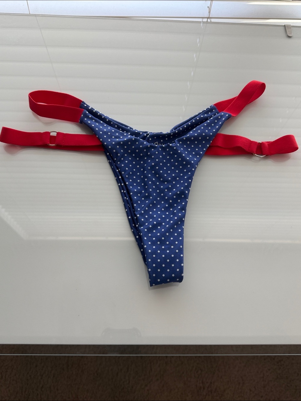 Polka Dot Navy Bikini Bottom with Red Straps and Ring Detailing